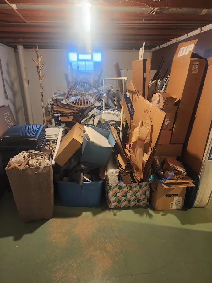 Roll-off dumpster container at job site for Yard Waste Dumpster Rental in Lowell